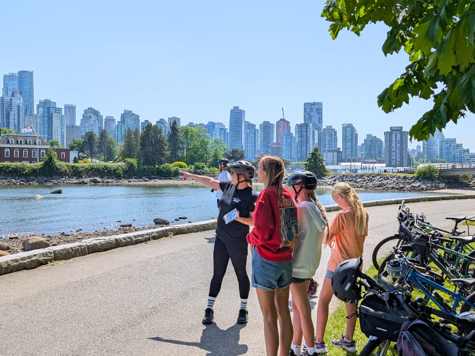 the tour group stops at deadman's island along stanley park seawall